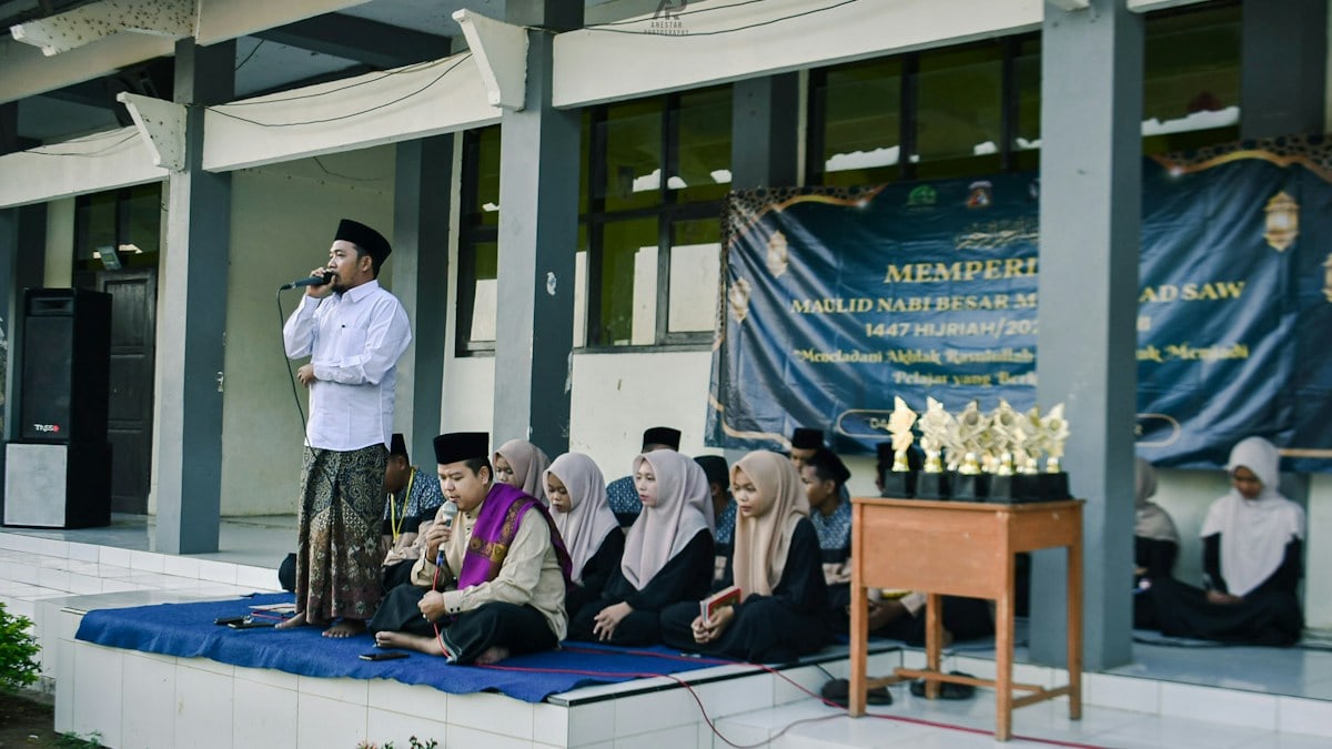 Young people participating in an outdoor event with trophies